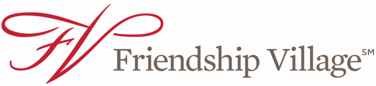 Logo for Friendship Village featuring a large red, script-style FV to the left of the words Friendship Village in gray, serif font.